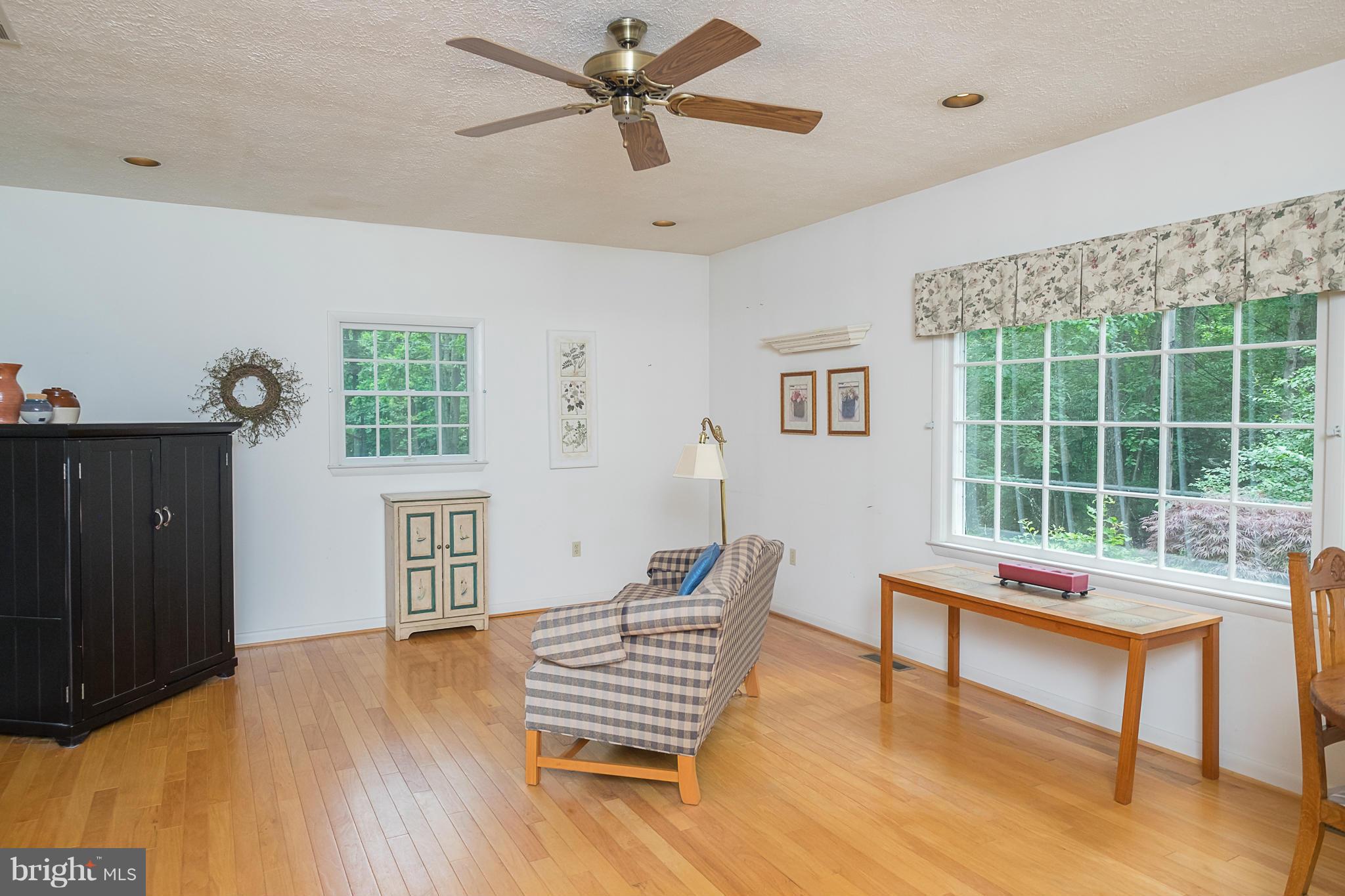 10836 Harding Road Laurel, MD 20723 - Photo 9 of 25 a reading room with furniture and a window