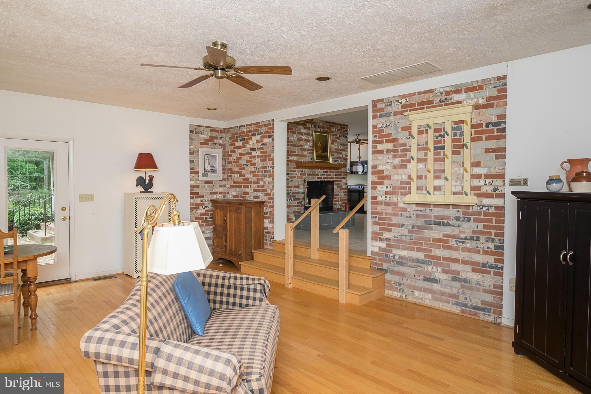 10836 Harding Road Laurel, MD 20723 - Photo 10 of 25 a living room with furniture a rug and a window