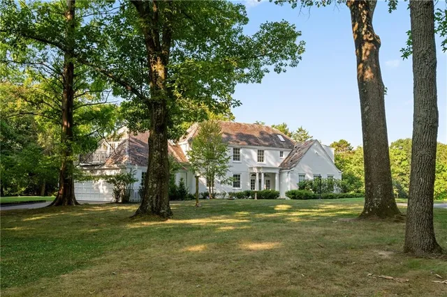 a house with garden in front of it