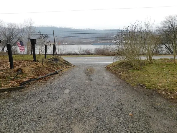 a view of a yard with an outdoor space