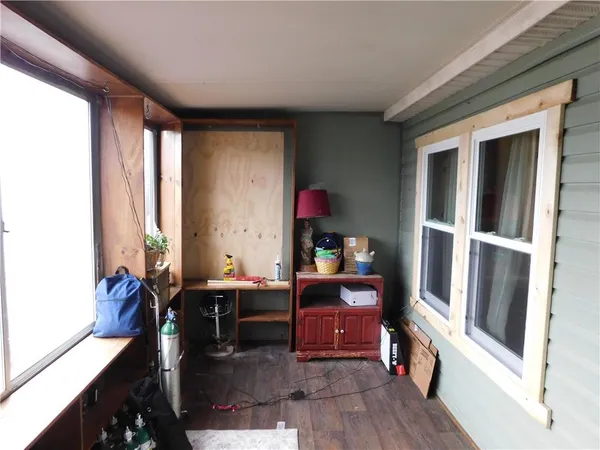 a room with furniture and a window