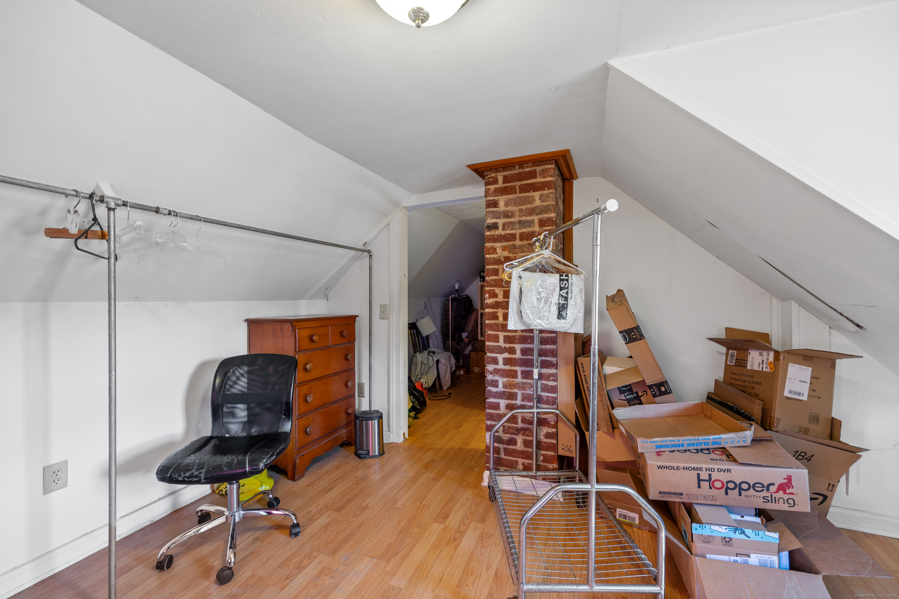 1557 Wolcott Road Wolcott, CT 06716 - Photo 14 of 18 a view of a livingroom with furniture and gym equipment