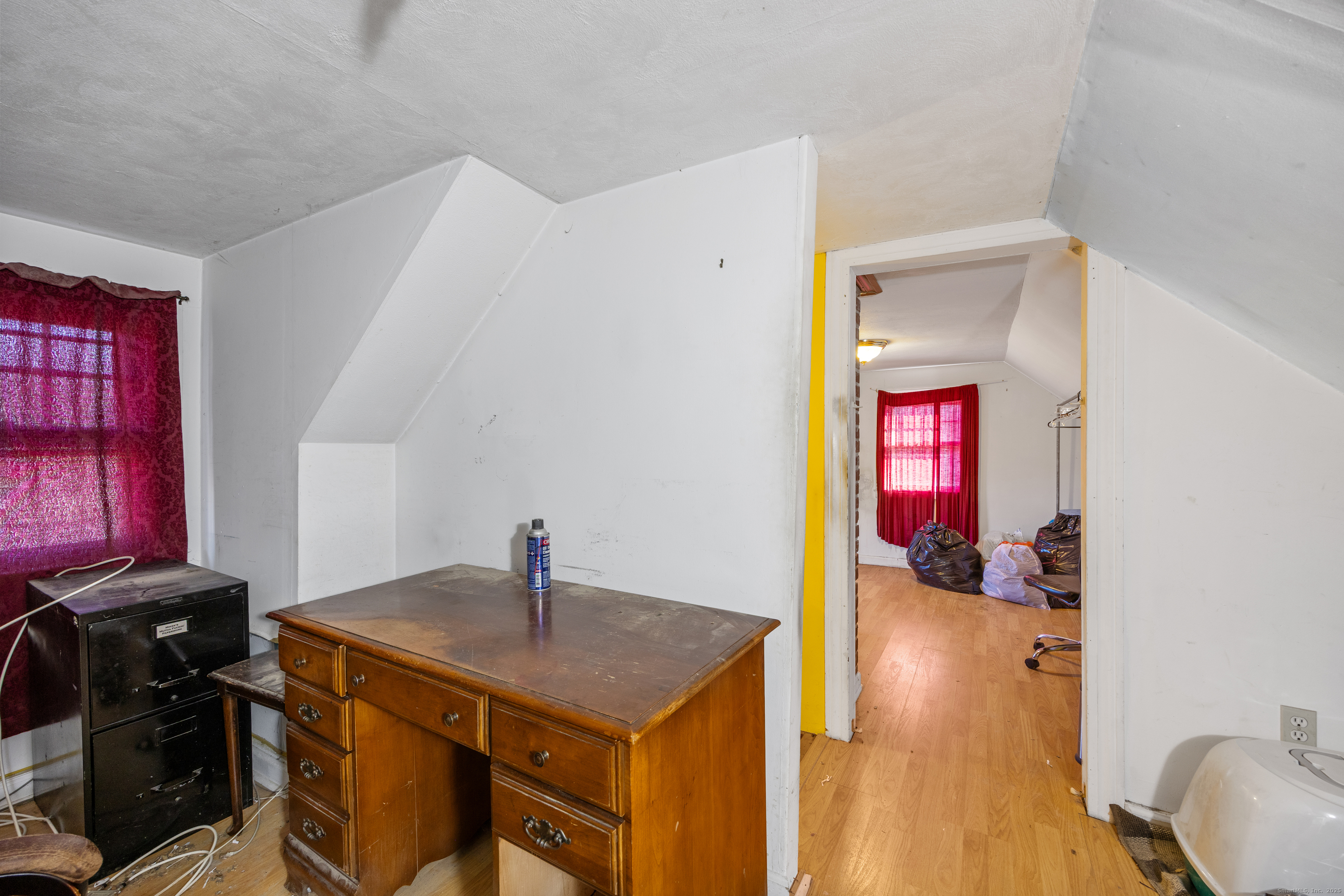 1557 Wolcott Road Wolcott, CT 06716 - Photo 16 of 18 a kitchen that has a microwave and a stove top oven