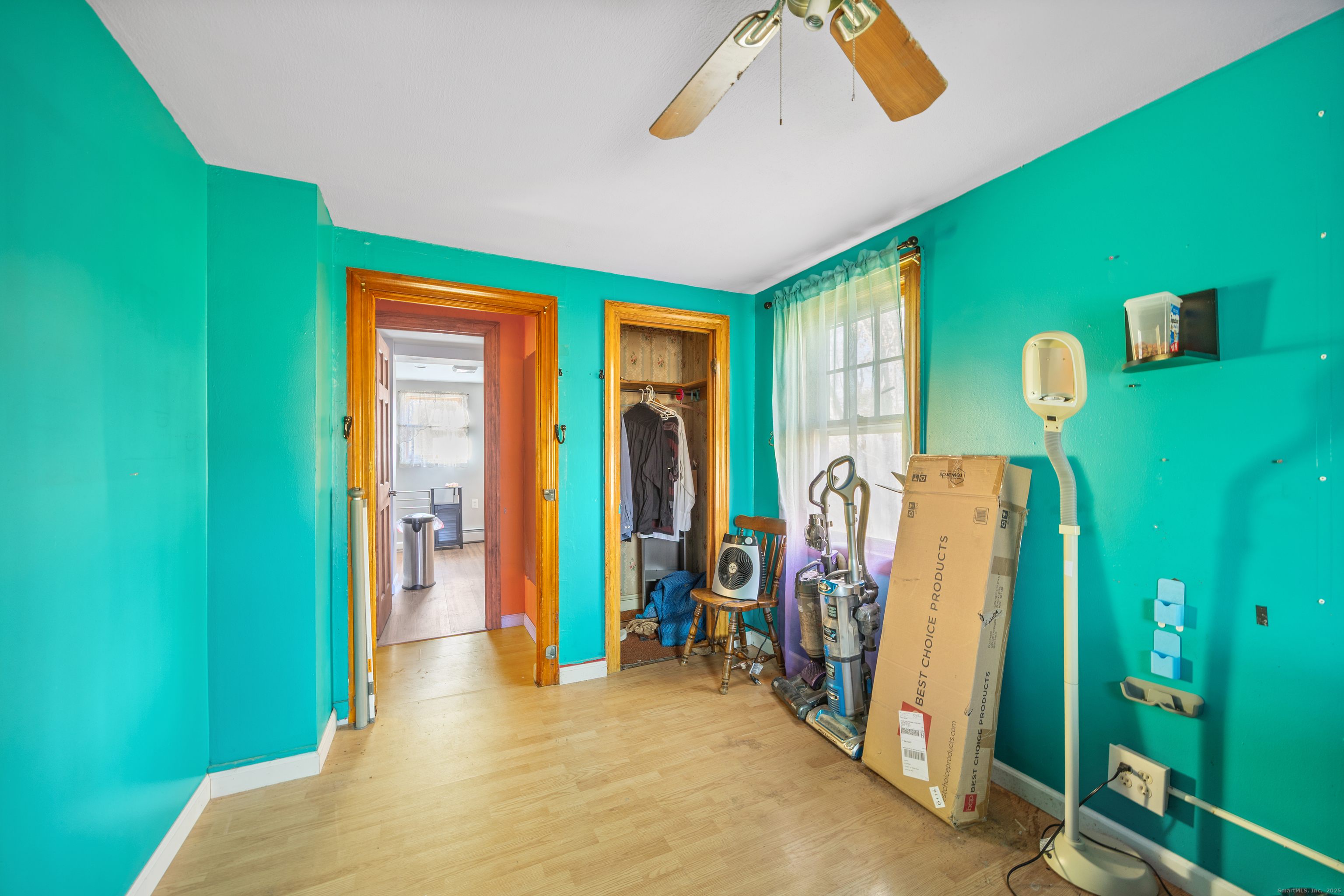 1557 Wolcott Road Wolcott, CT 06716 - Photo 9 of 18 a view of a livingroom with furniture and stairs