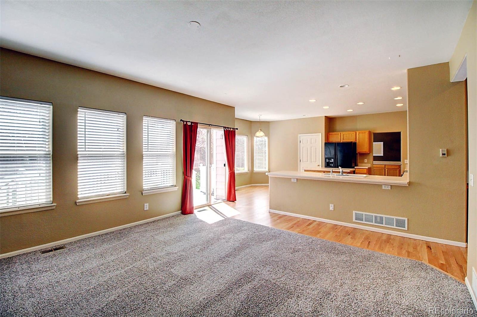 5794 South Rome Street Aurora, CO 80015 - Photo 12 of 37 a view of an empty room with a window