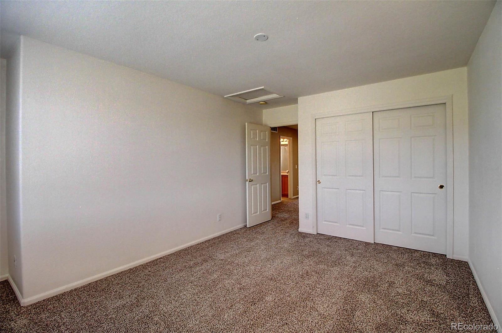 5794 South Rome Street Aurora, CO 80015 - Photo 31 of 37 an empty room with closet