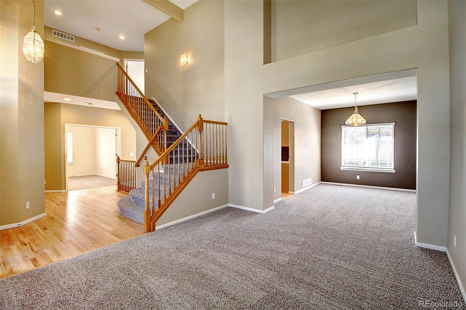 5794 South Rome Street Aurora, CO 80015 - Photo 4 of 37 a view of an entryway with a livingroom