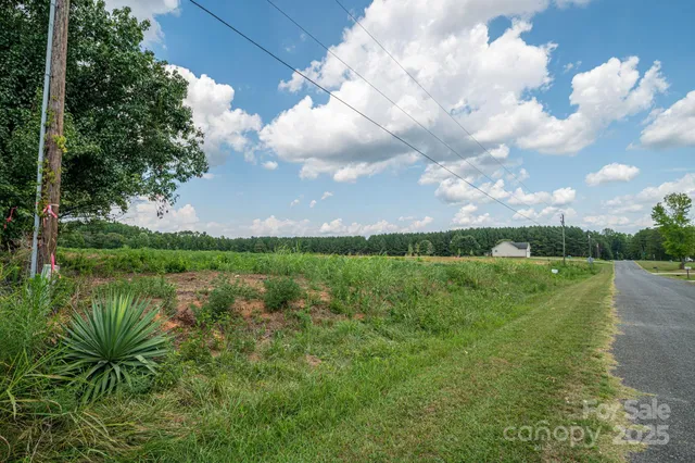 a view of a lake with a big yard