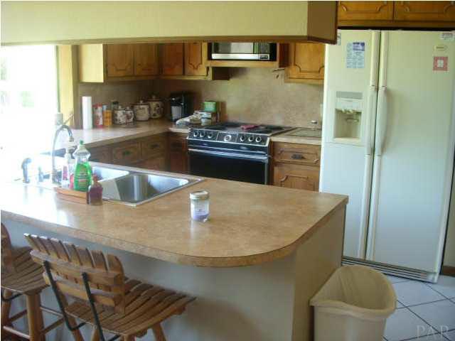 740 Freedom Road Century, FL 32535 - Photo 15 of 19 KITCHEN/BREAKFAST BAR