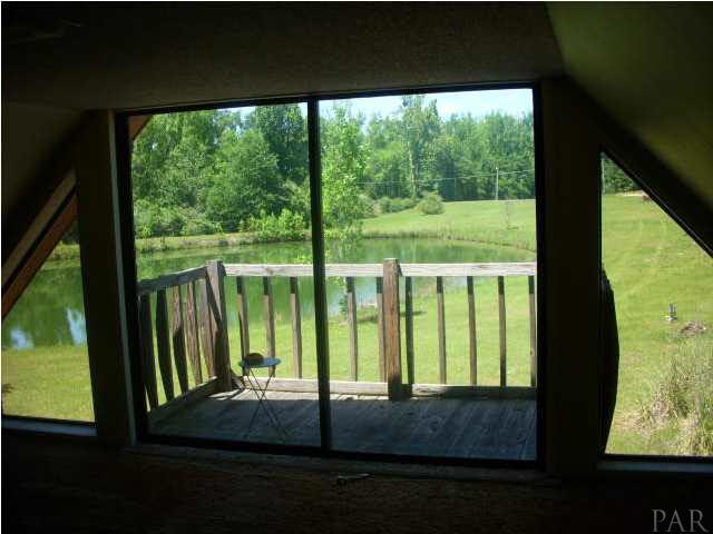 740 Freedom Road Century, FL 32535 - Photo 10 of 19 VIEW FROM UPSTAIRS BONUS ROOM LOOKING OUT