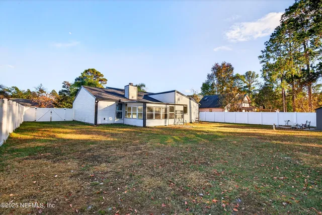 a view of a house with swimming pool