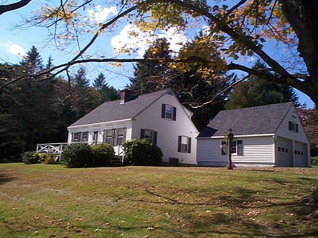 2 Town Farm Road New Milford, CT 06776 - Photo 1 of 1 a front view of a house with a garden