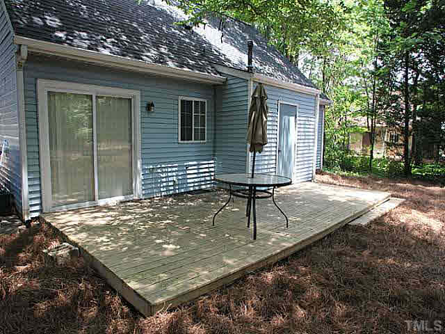 2113 Mariner Circle Raleigh, NC 27603 - Photo 11 of 13 Large freshly power washed deck with sliding glass doors to kitchen.