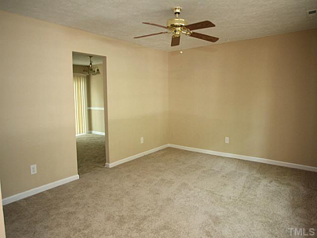 2113 Mariner Circle Raleigh, NC 27603 - Photo 3 of 13 Living room towards kitchen and dining areas