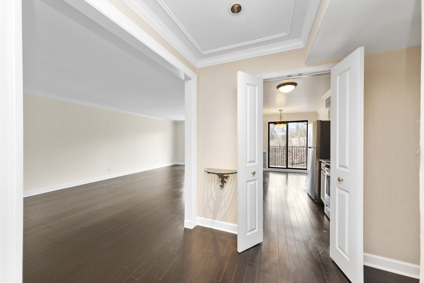 1-s150 Spring Road, Unit 2D Oak Brook, IL 60181 - Photo 12 of 22 an empty room with wooden floor and windows