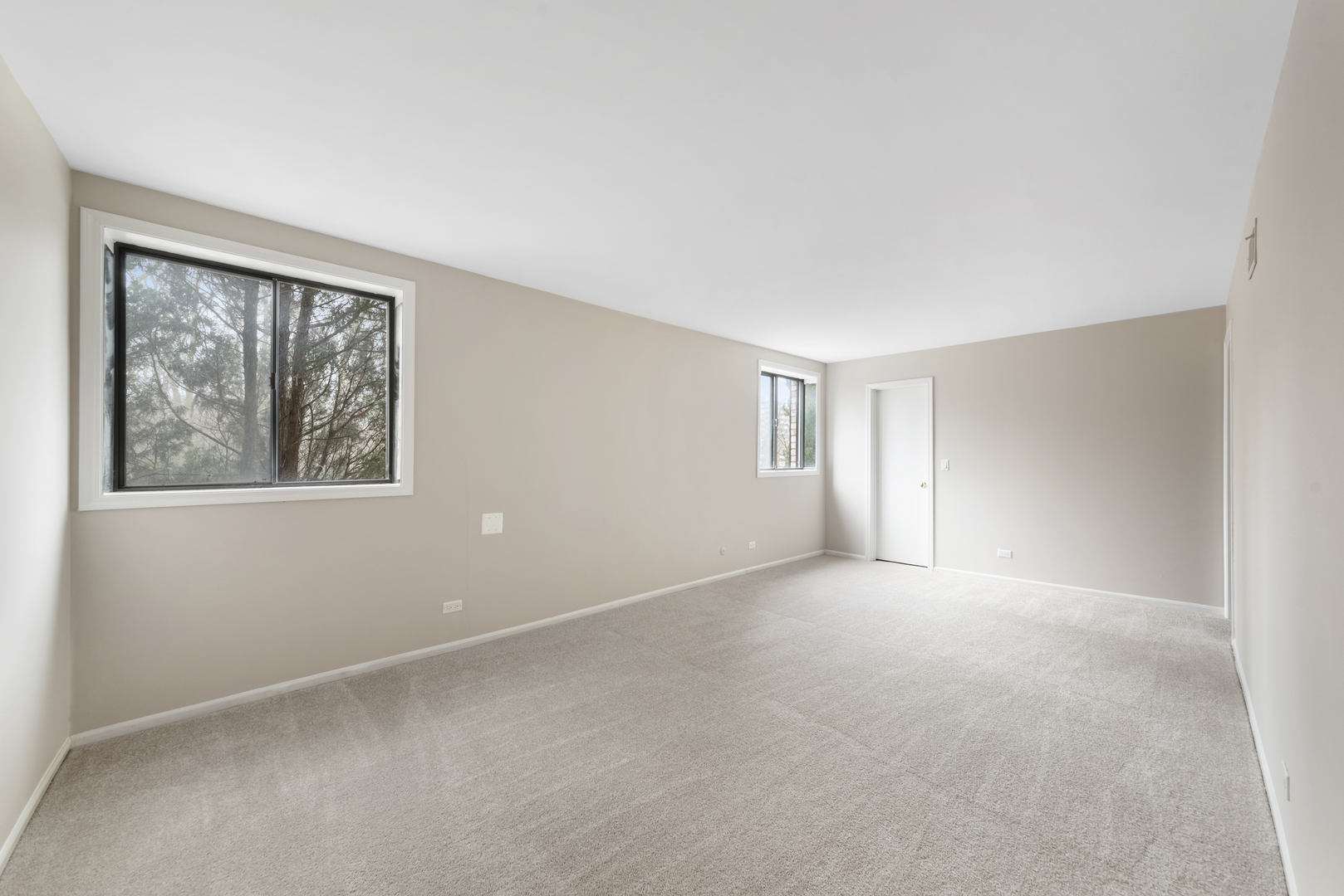 1-s150 Spring Road, Unit 2D Oak Brook, IL 60181 - Photo 16 of 22 a view of an empty room with a window