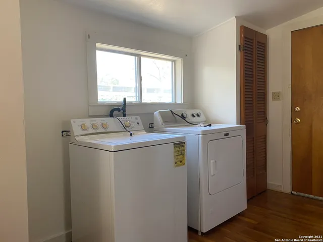 a utility room with dryer and washer
