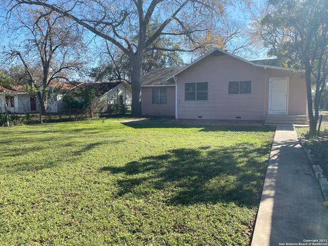 a house view with a outdoor space