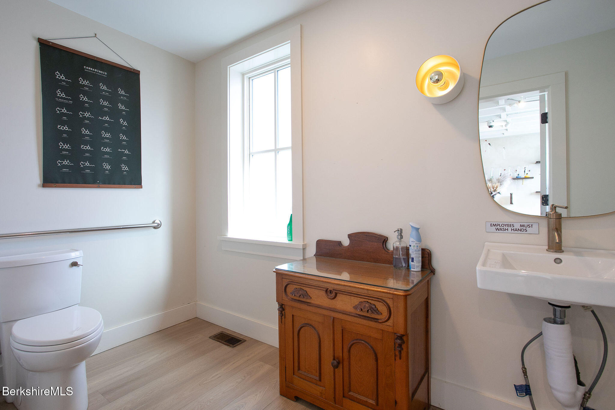 783 Main Street Great Barrington, MA 01230 - Photo 6 of 31 a bathroom with a toilet sink and mirror