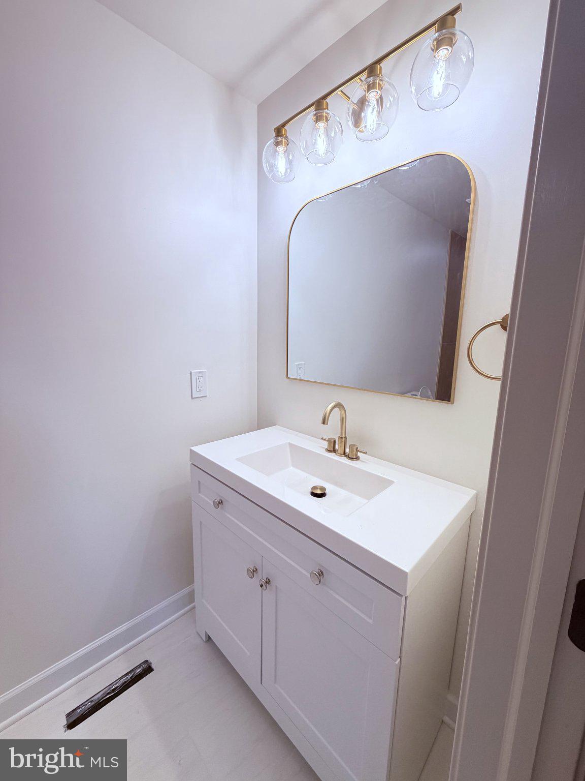 23417 Jordan-Smith Road Ruther Glen, VA 22546 - Photo 7 of 8 Elegant bathroom with modern fixtures.