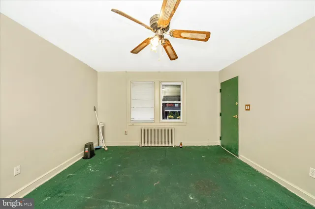 a view of a livingroom with a workspace