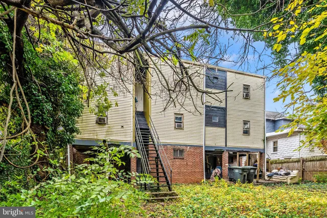 a view of a building with a tree