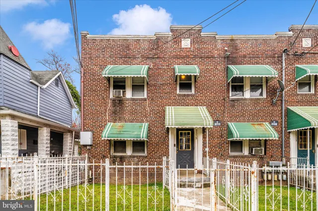 a front view of a house with balcony