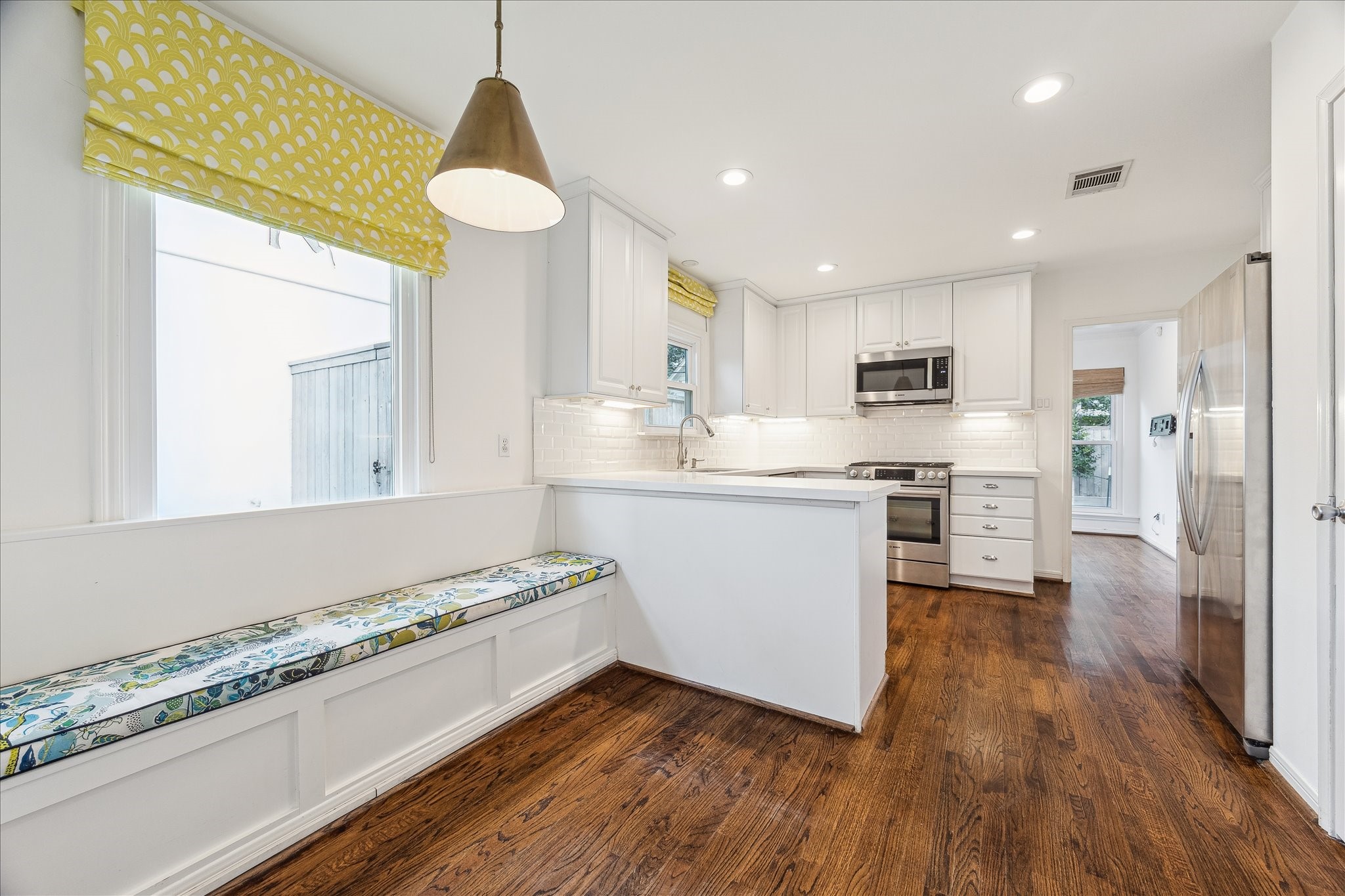 2820 Rice Boulevard West University Place, TX 77005 - Photo 12 of 37 BREAKFAST AREA. With built in bench/storage seating, this is the perfect spot for a breakfast table.