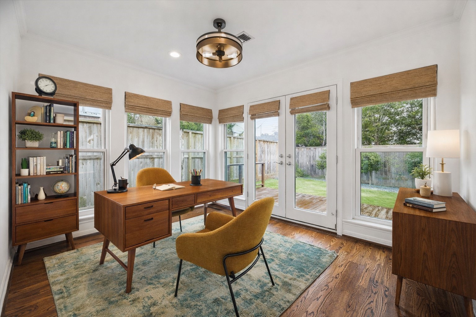 2820 Rice Boulevard West University Place, TX 77005 - Photo 13 of 37 SUNROOM. Located at the back of the home, off the kitchen, this sunny space is just lovely. Use as a sunroom or home office. Virtually staged for inspiration.