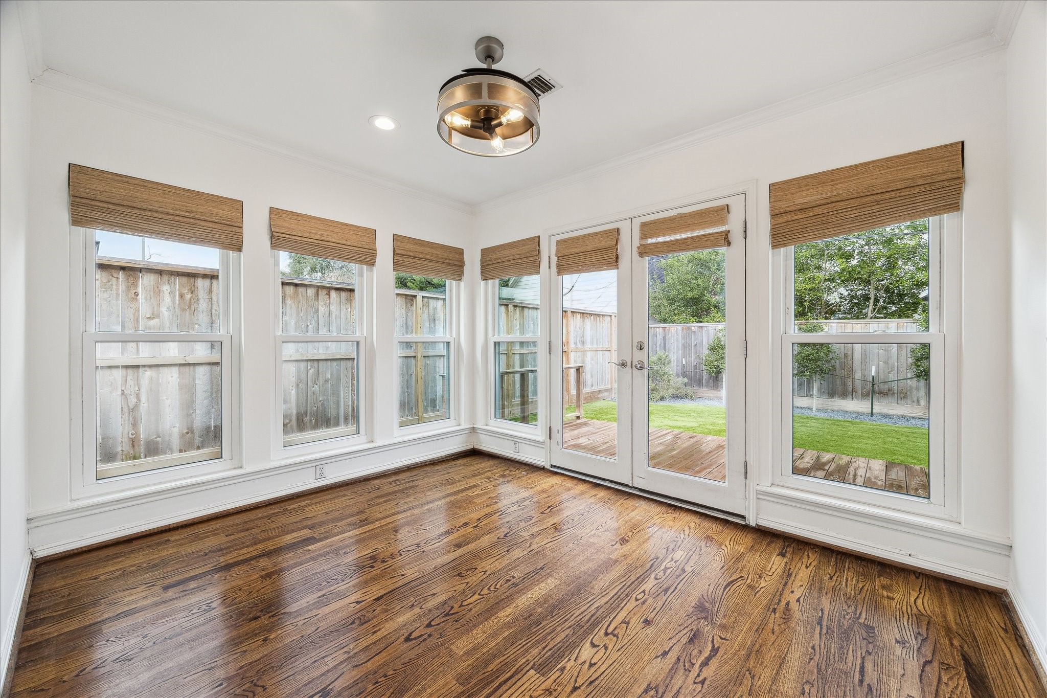 2820 Rice Boulevard West University Place, TX 77005 - Photo 15 of 37 SUNROOM. A door opens out onto the deck.