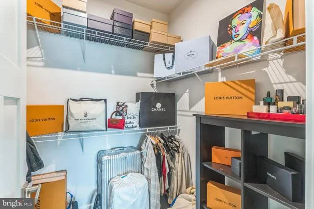 a bathroom with a sink vanity tub and a mirror