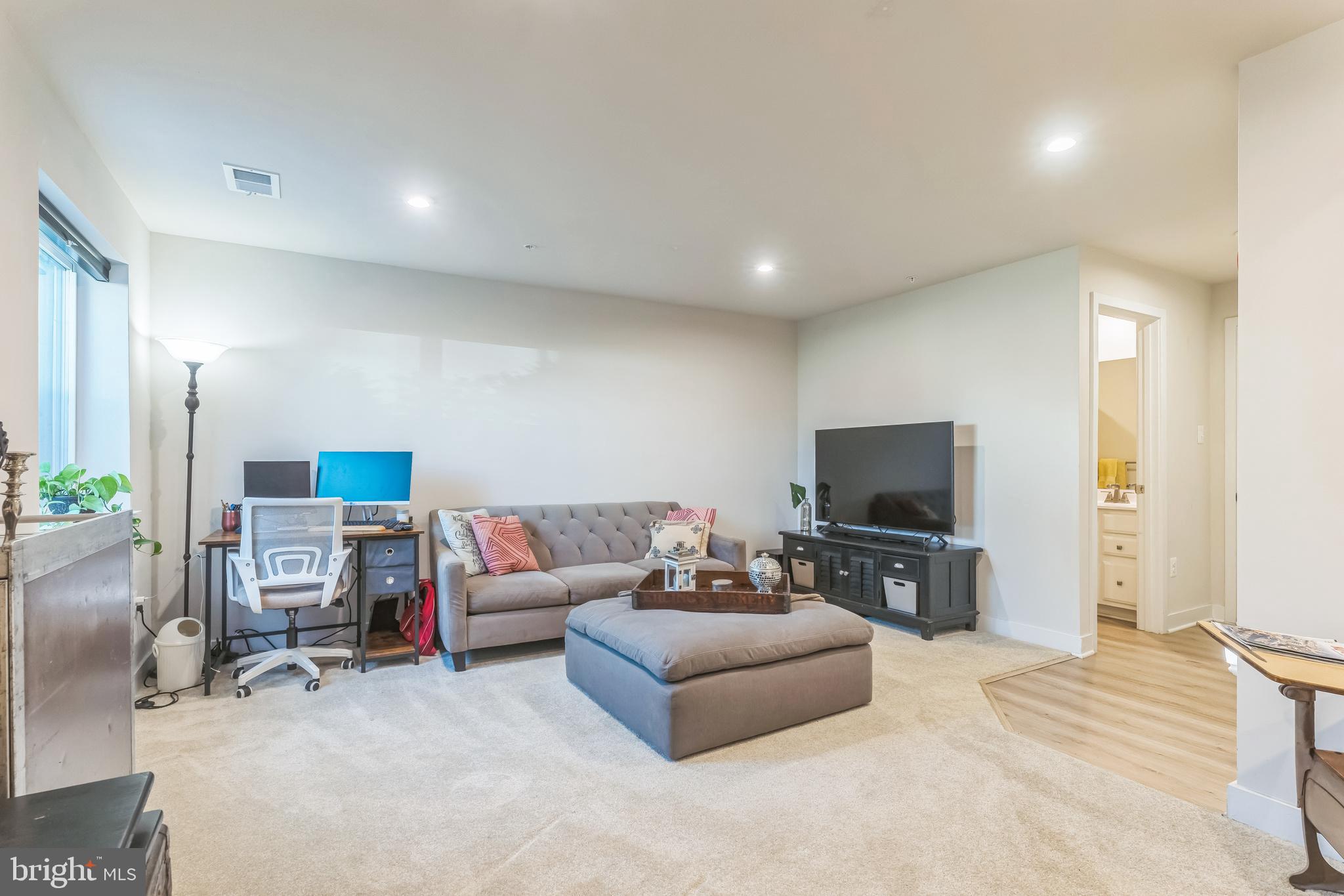 235 Edwin Road Frederick, MD 21702 - Photo 24 of 28 a living room with furniture and a flat screen tv