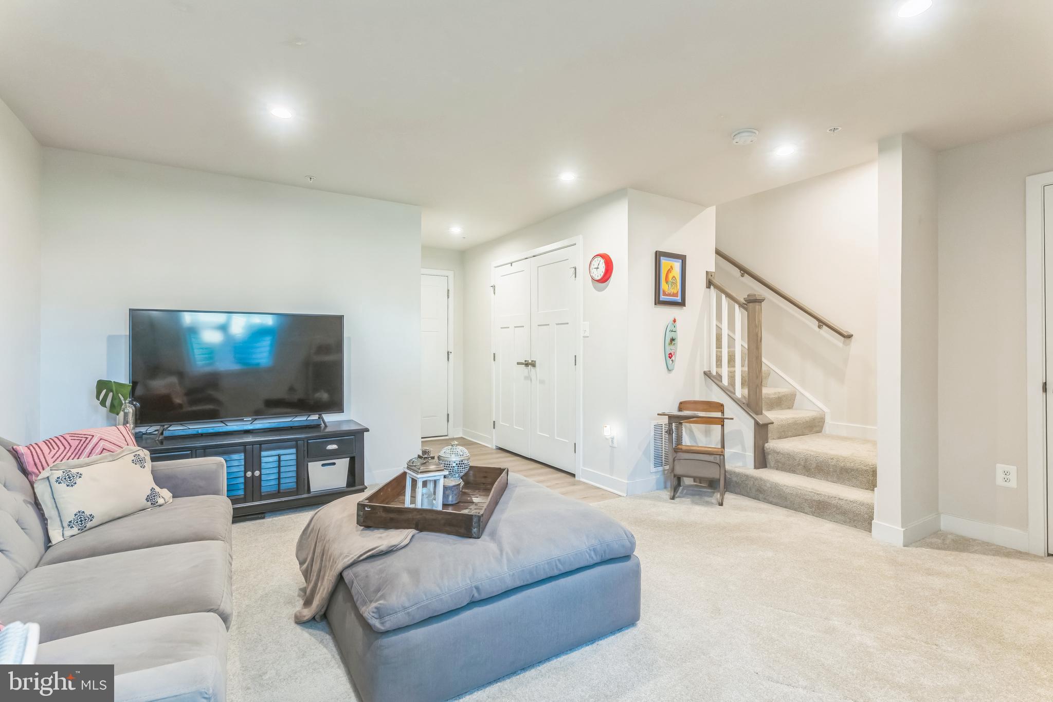 235 Edwin Road Frederick, MD 21702 - Photo 25 of 28 a living room with furniture and a flat screen tv