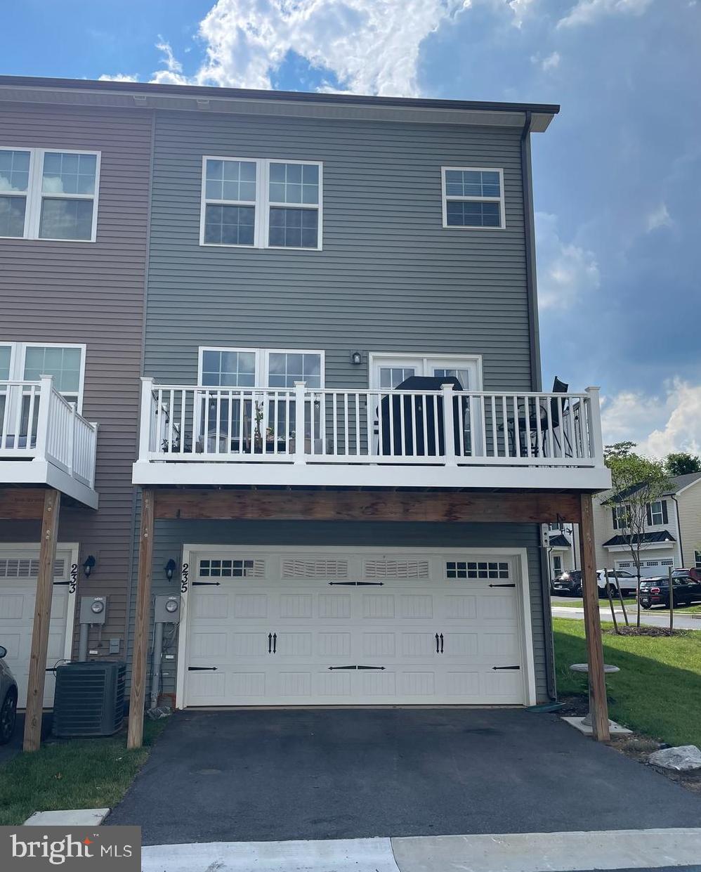 235 Edwin Road Frederick, MD 21702 - Photo 28 of 28 a view of a house with wooden deck and furniture