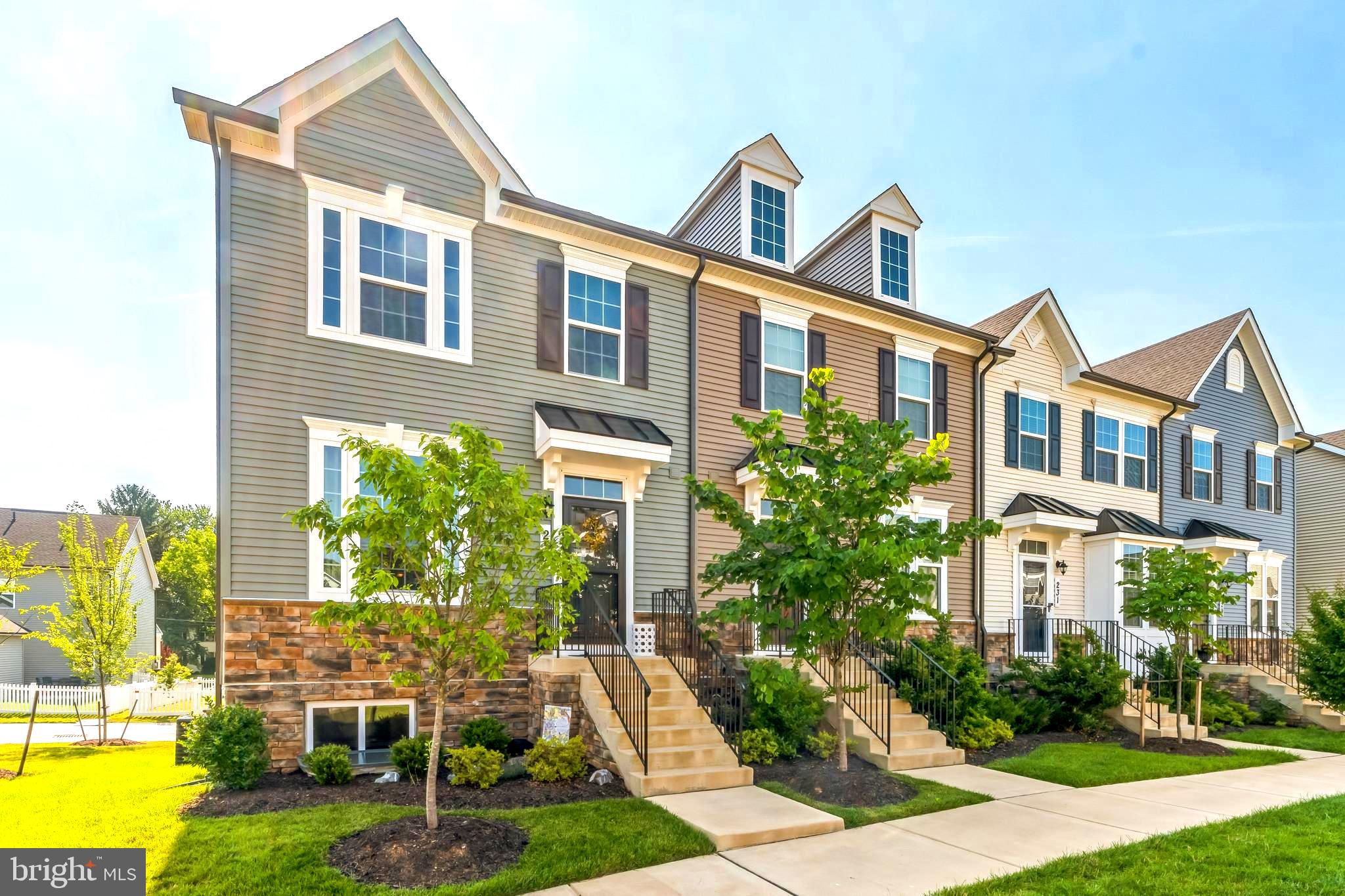 235 Edwin Road Frederick, MD 21702 - Photo 3 of 28 a front view of a house with garden