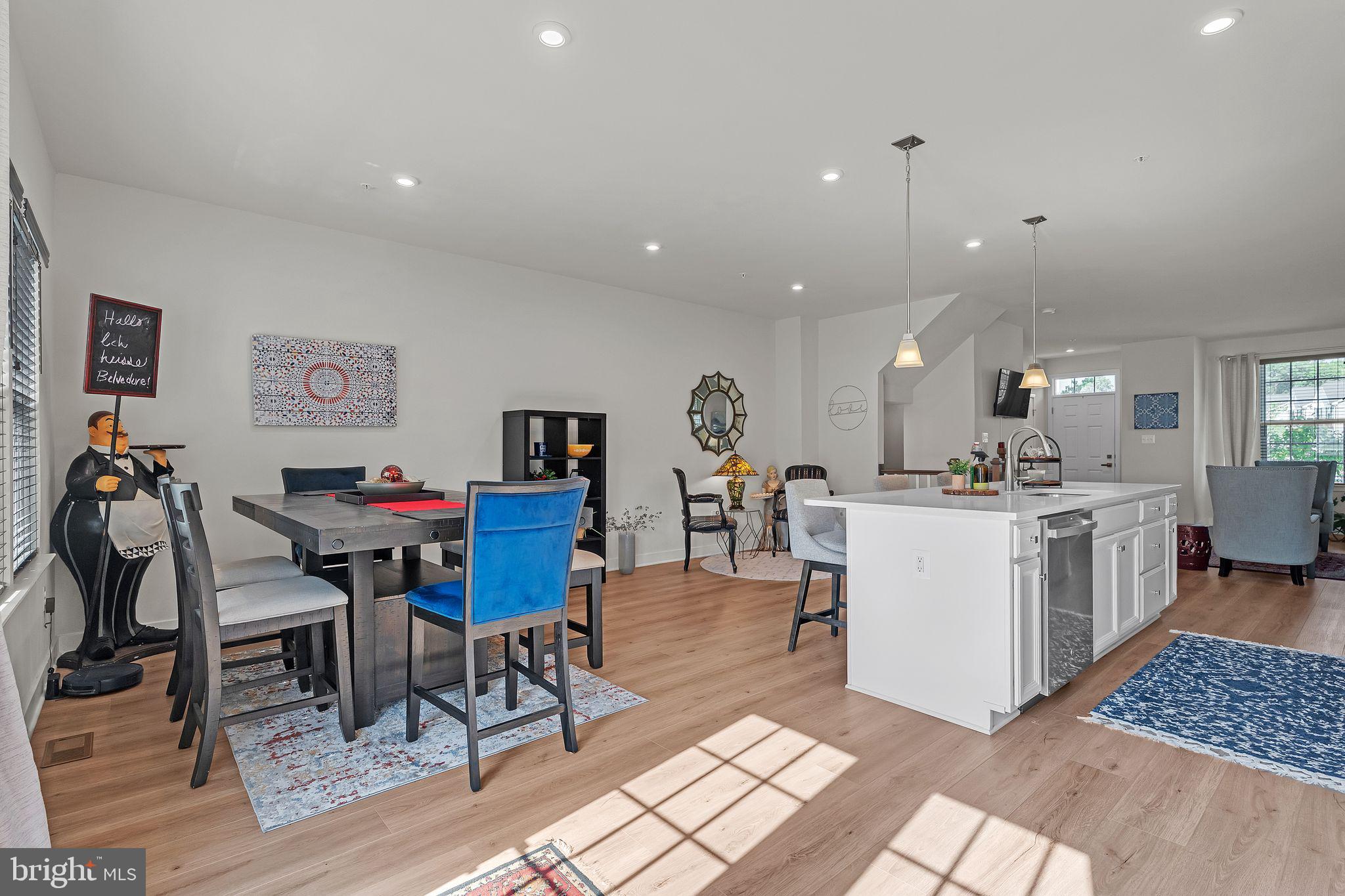 235 Edwin Road Frederick, MD 21702 - Photo 9 of 28 a living room with furniture a dining table and kitchen view