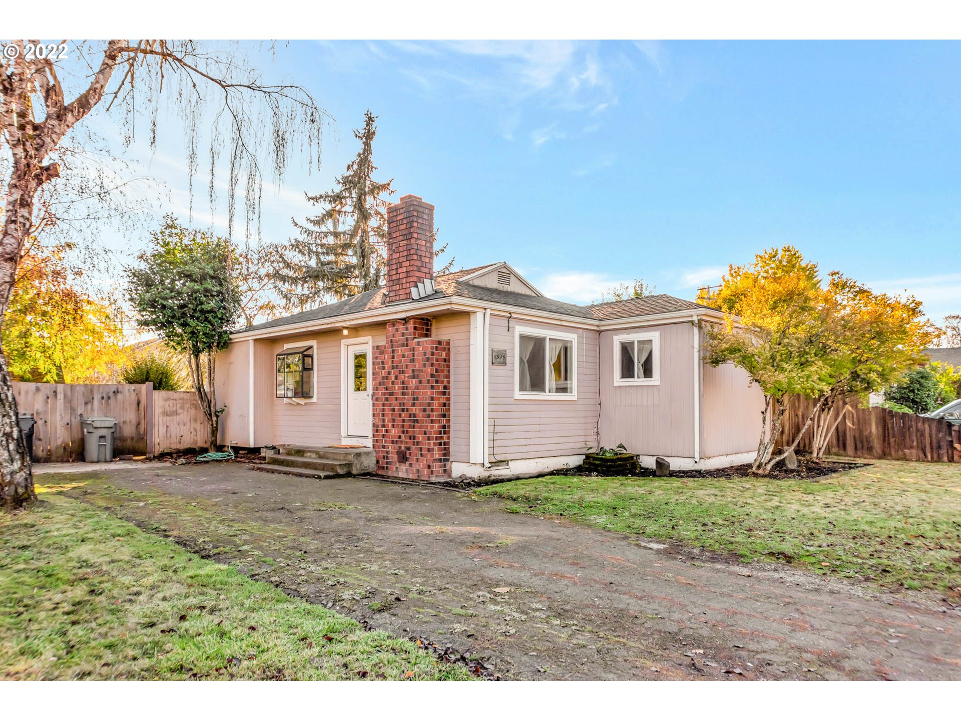 1849 H Street Springfield, OR 97477 - Photo 1 of 17 a view of a house with a yard