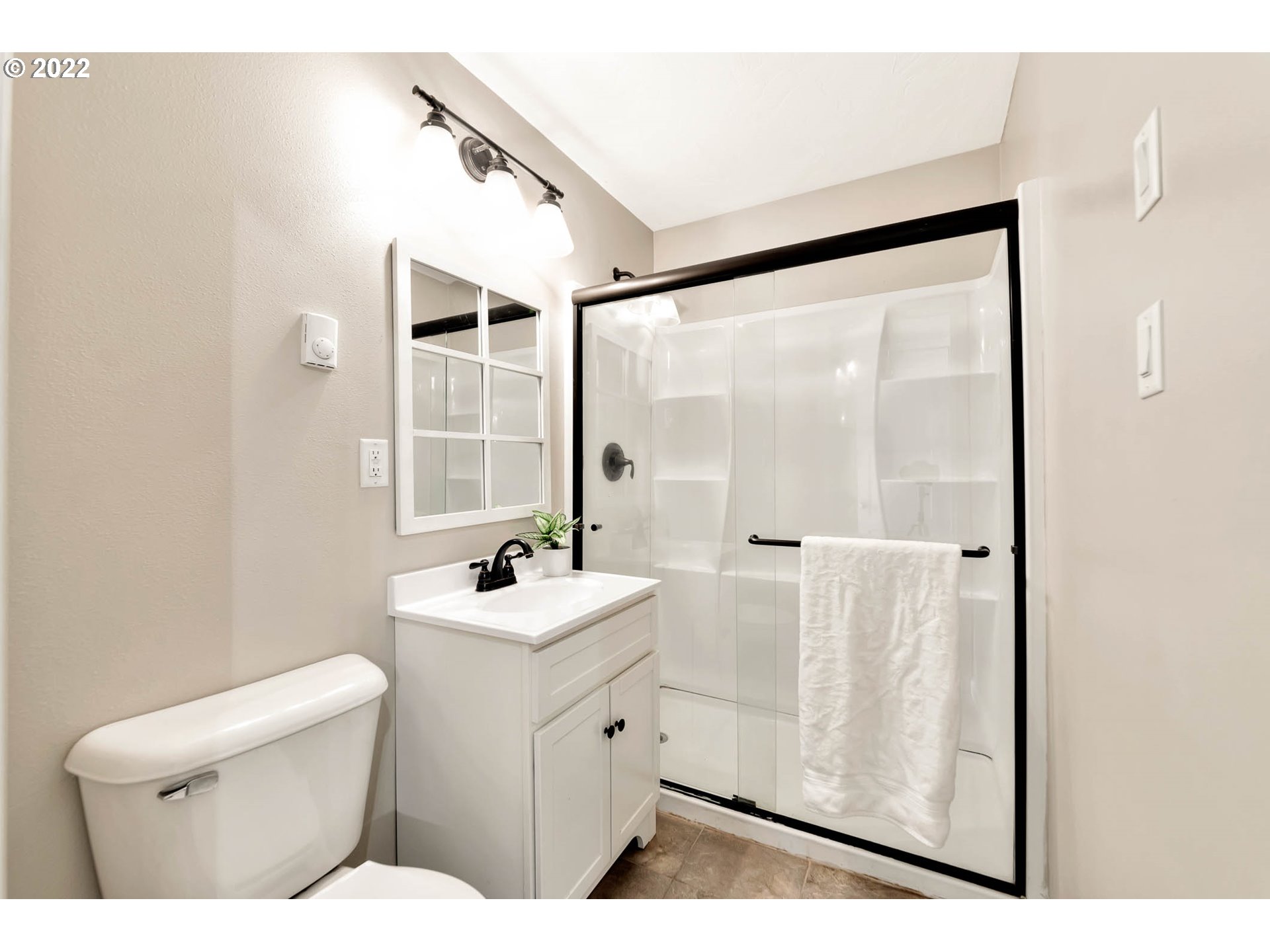 1849 H Street Springfield, OR 97477 - Photo 11 of 17 a bathroom with a toilet sink and a mirror
