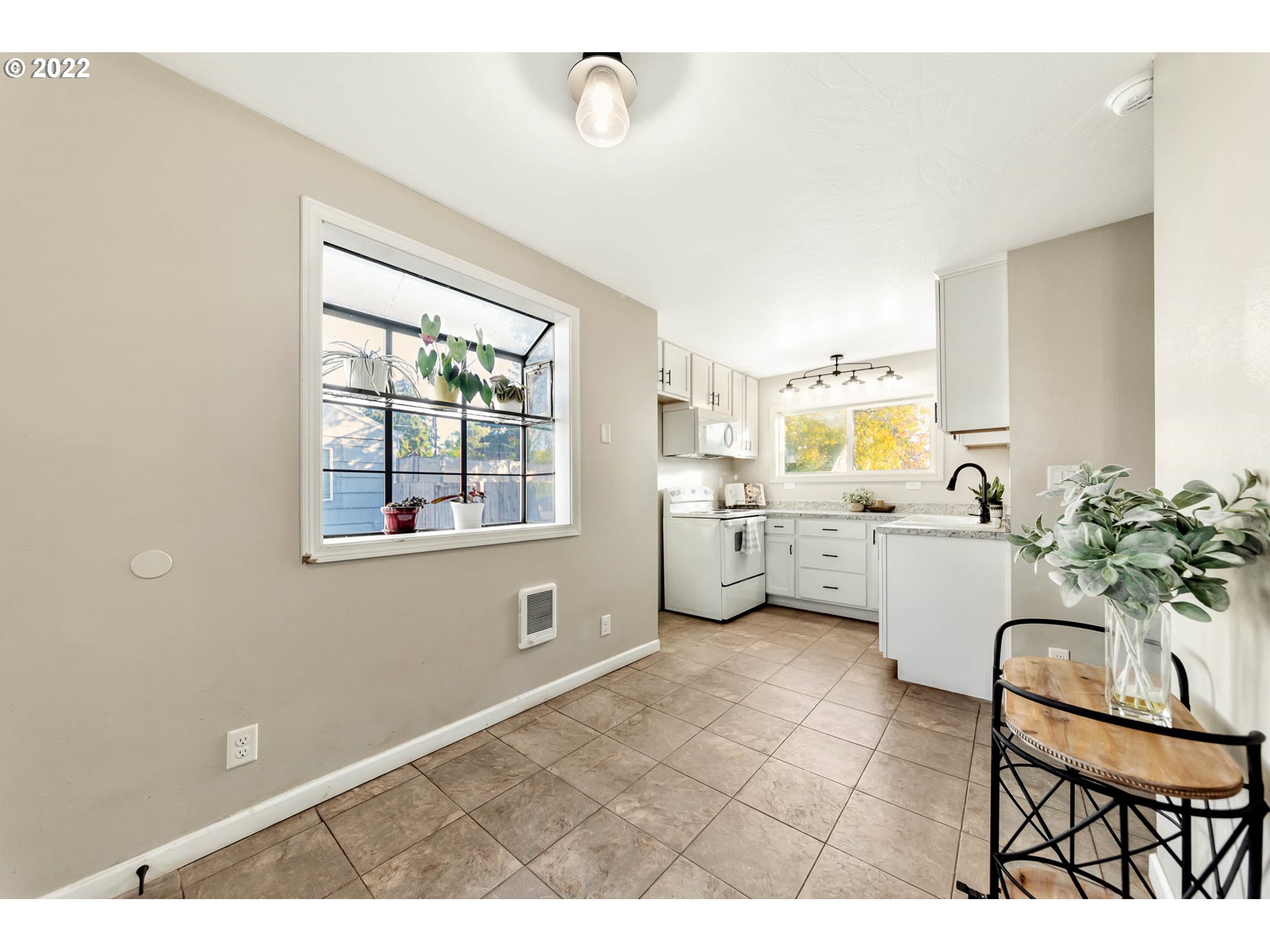 1849 H Street Springfield, OR 97477 - Photo 5 of 17 a kitchen with a sink cabinets and window
