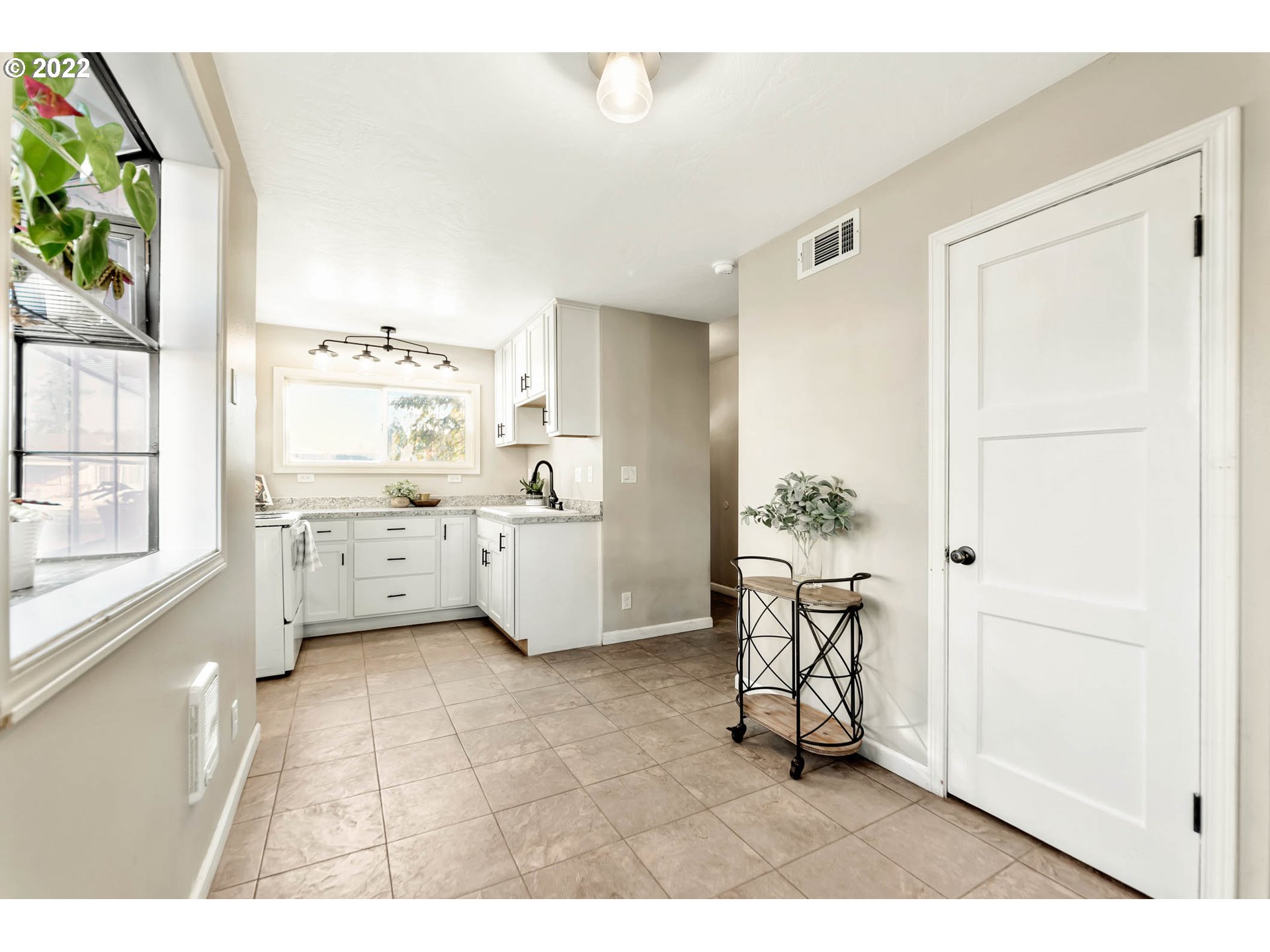 1849 H Street Springfield, OR 97477 - Photo 6 of 17 a view of kitchen with furniture wooden floor and window