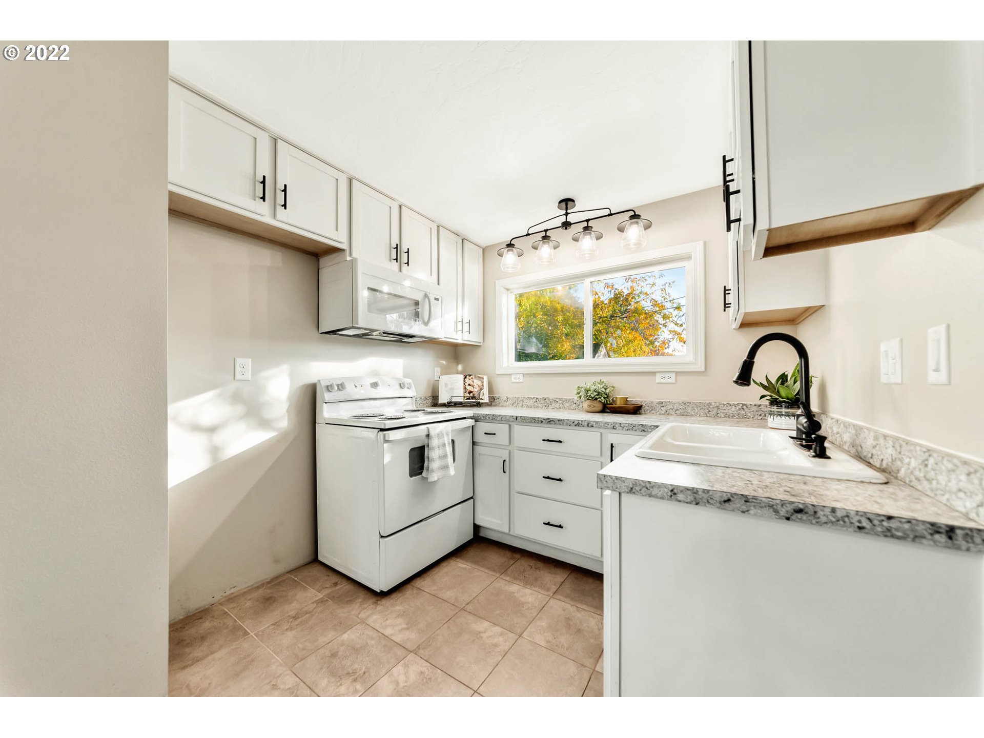 1849 H Street Springfield, OR 97477 - Photo 8 of 17 a kitchen with appliances cabinets and a sink
