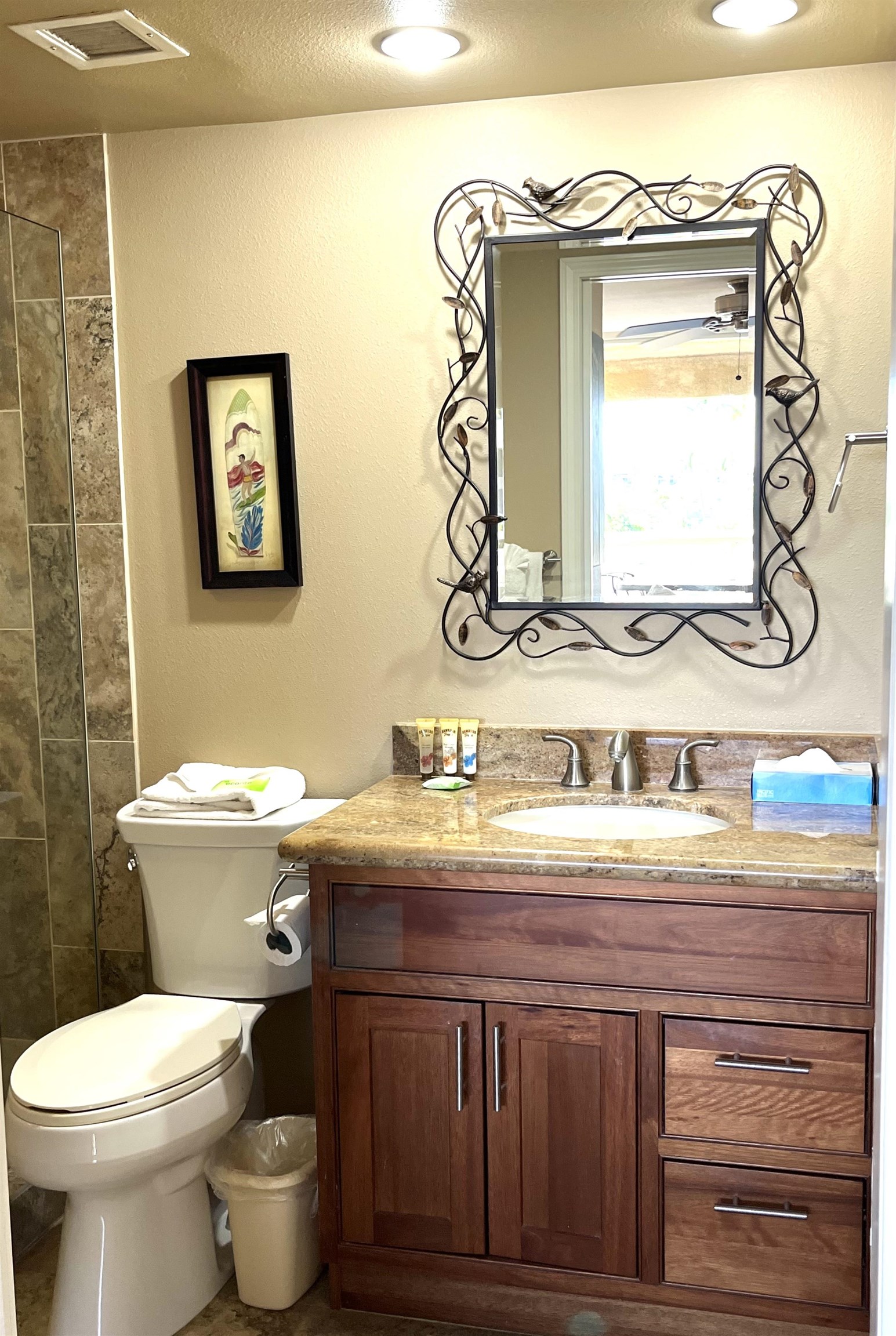 2575 South Kihei Road, Unit H414 Kihei, HI 96753 - Photo 15 of 30 a bathroom with a granite countertop sink mirror vanity and toilet