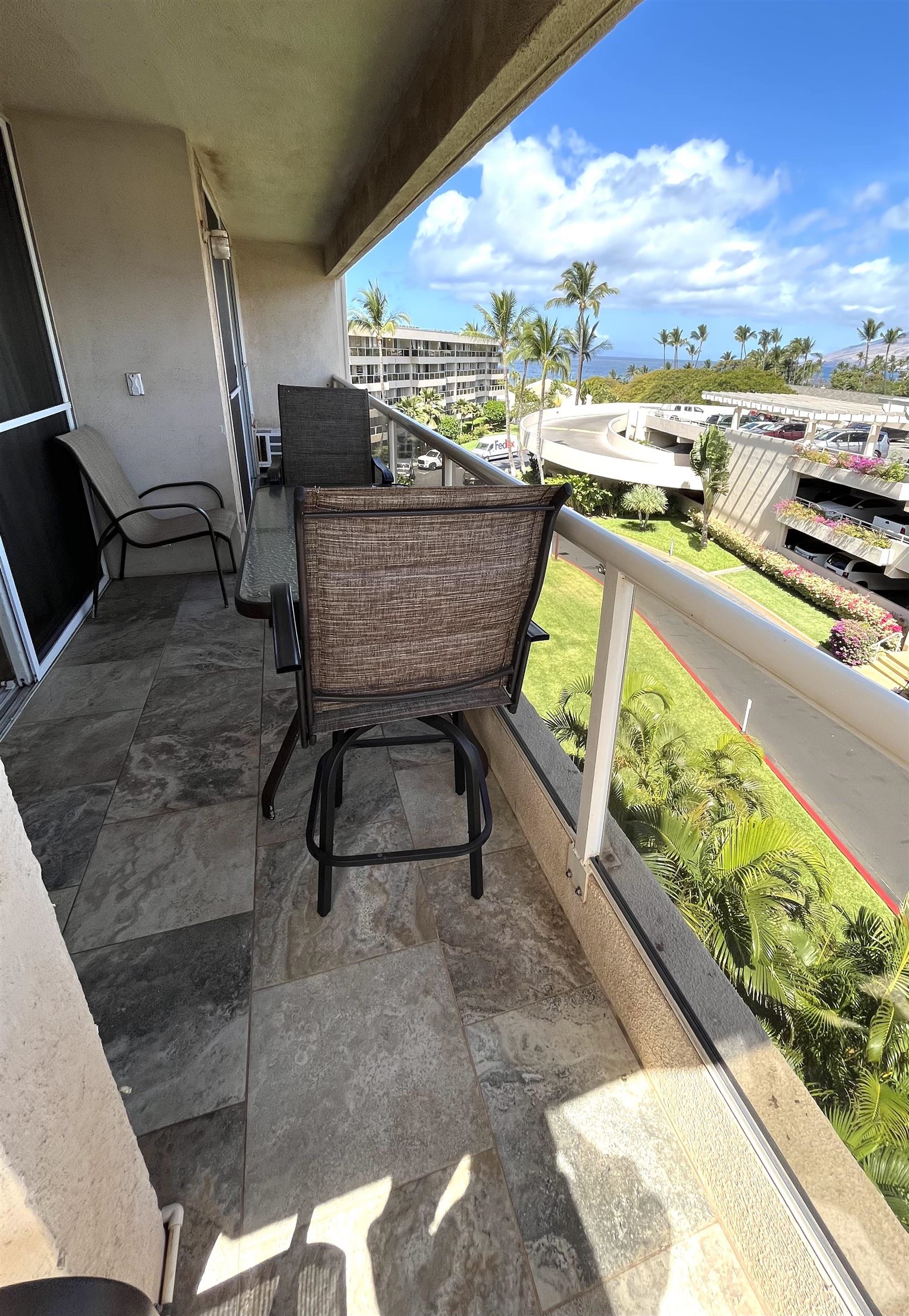 2575 South Kihei Road, Unit H414 Kihei, HI 96753 - Photo 21 of 30 a living room with patio furniture