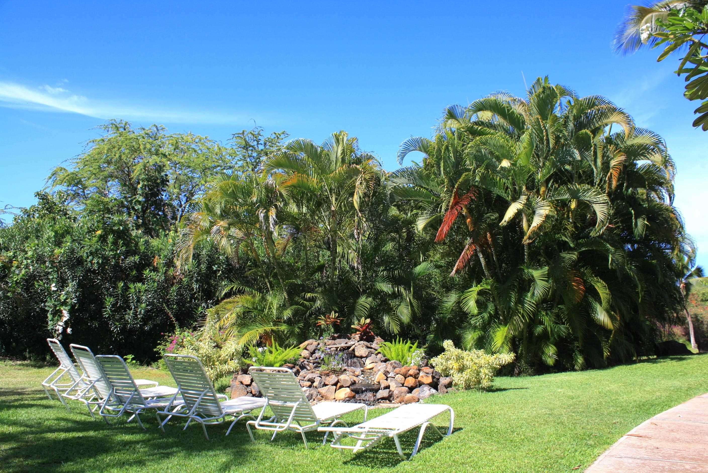 2575 South Kihei Road, Unit H414 Kihei, HI 96753 - Photo 24 of 30 a view of a lake with a yard
