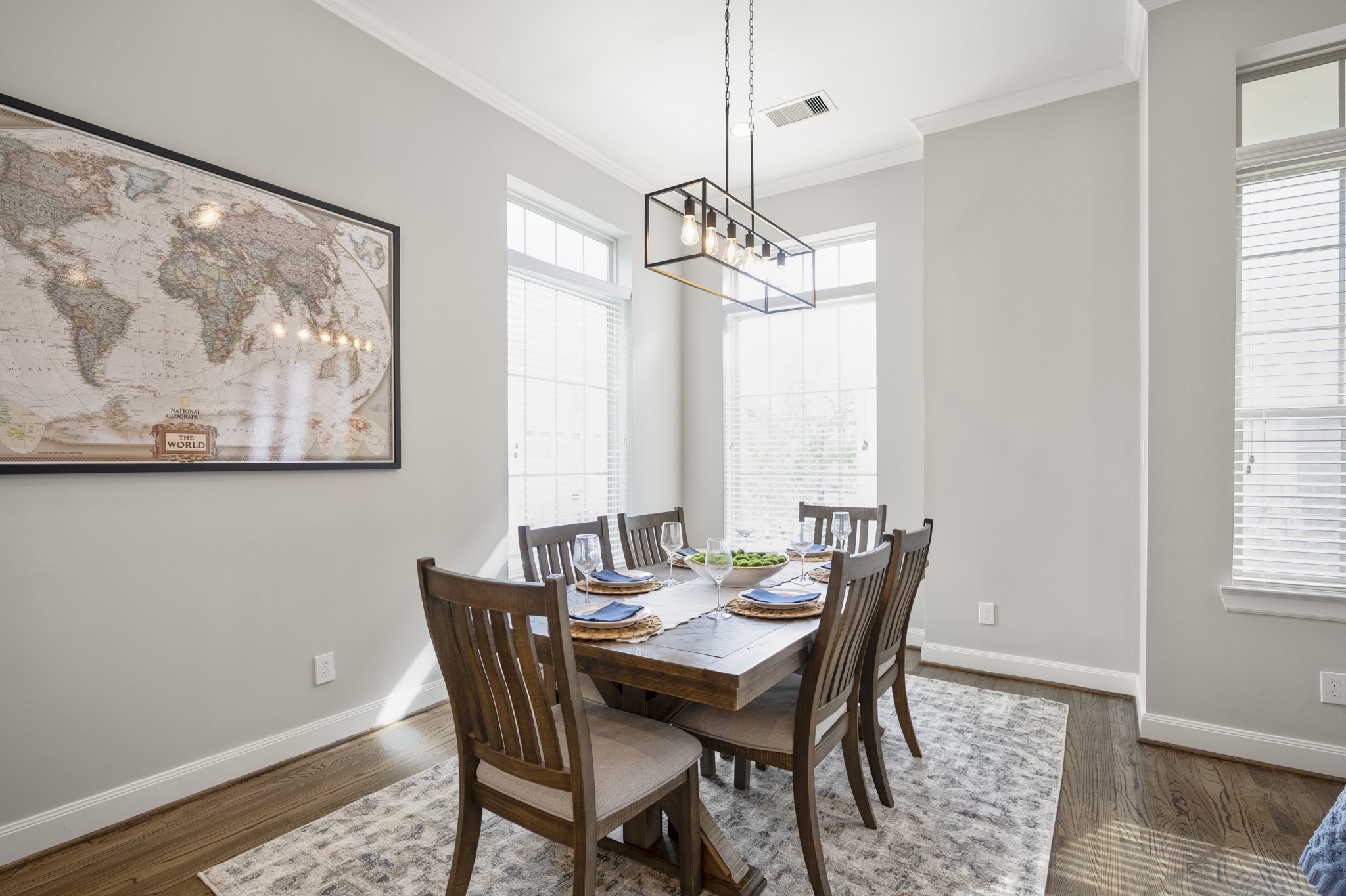 1032 West 26th Street, Unit D Houston, TX 77008 - Photo 22 of 42 a view of a dining room with furniture window and wooden floor