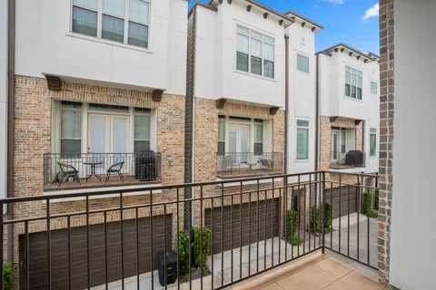 a view of a building from a balcony