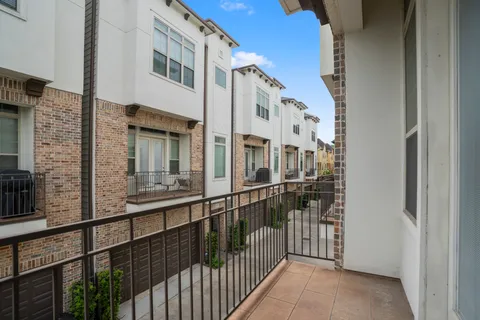 a view of a building from a balcony