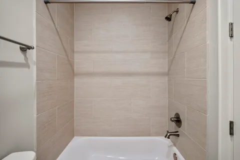 a bathroom with a bathtub