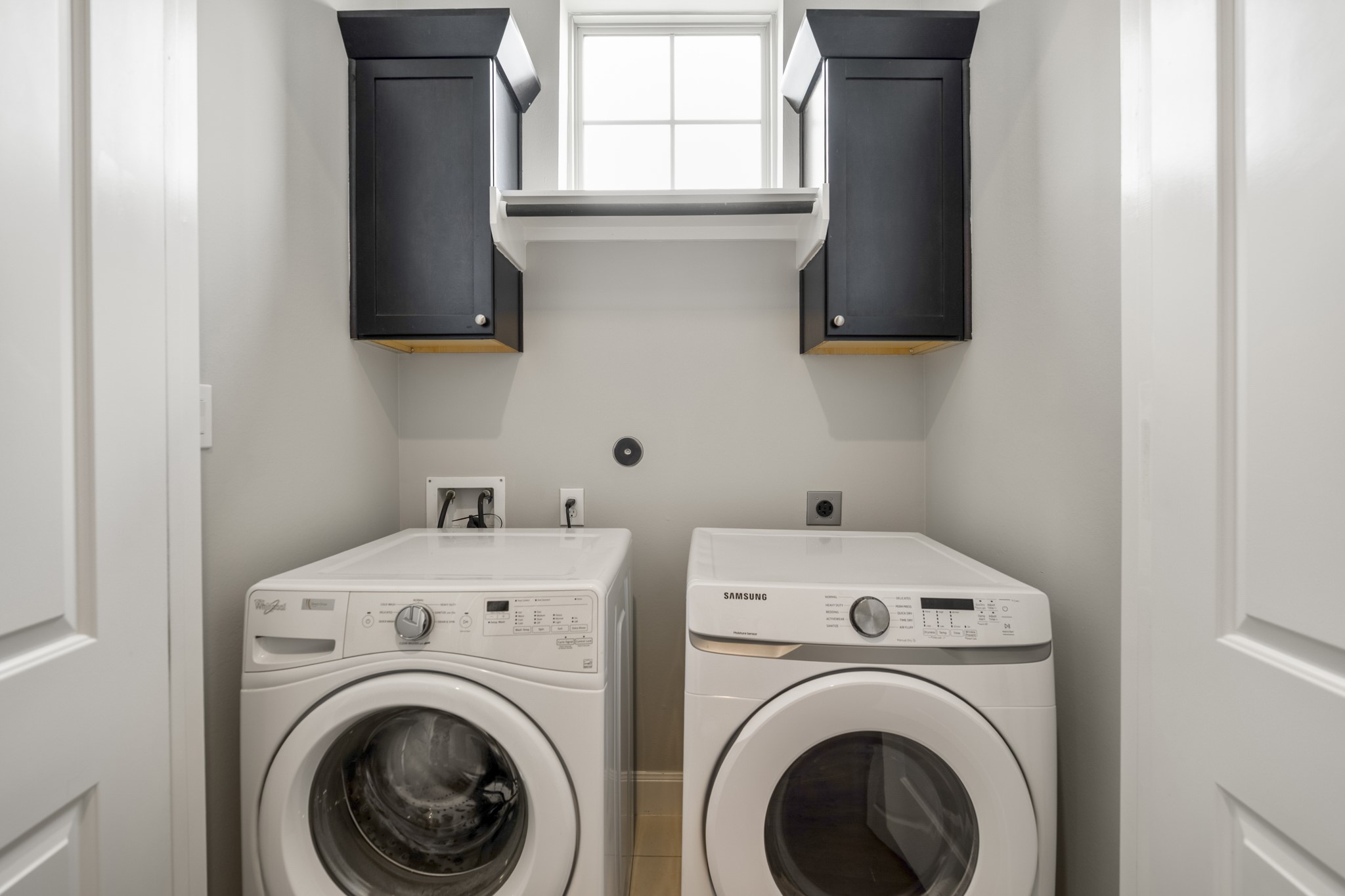 1032 West 26th Street, Unit D Houston, TX 77008 - Photo 32 of 42 a utility room with dryer and washer