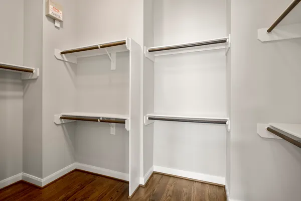 a view of an empty walk in closet